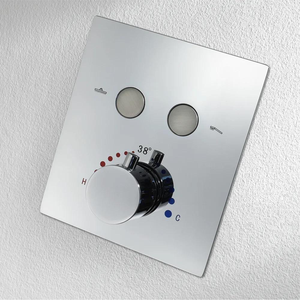 Wall-mounted chrome 2-function thermostatic shower valve with two silver push buttons, temperature control knob and red and blue temperature markings.