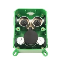 Front view of a 2-function thermostatic shower valve rough-in with matte-black-temperature knob and exposed valve components inside a green ABS box.