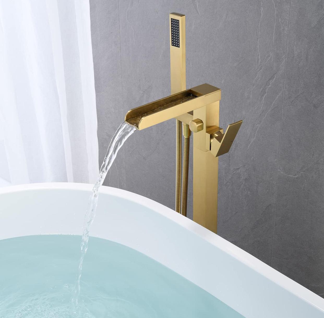 Tub Filler Waterfall Faucet Single Handle Floor Mount With Rough-In And Handheld Brushed gold