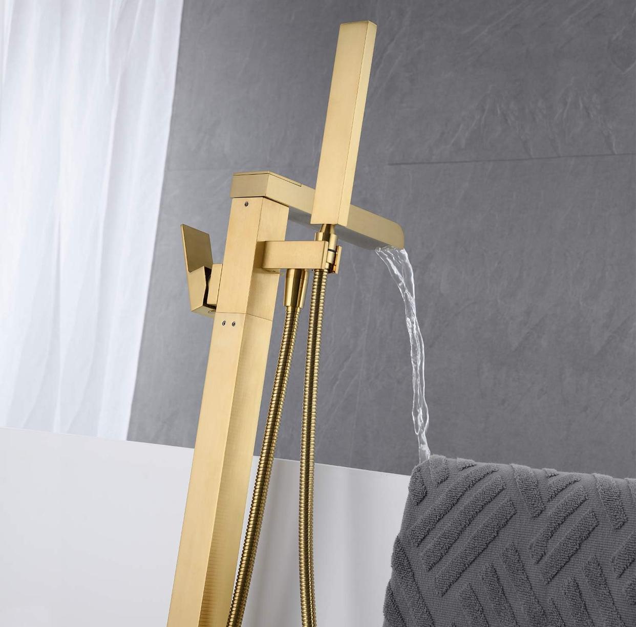 Tub Filler Waterfall Faucet Single Handle Floor Mount With Rough-In And Handheld Brushed gold
