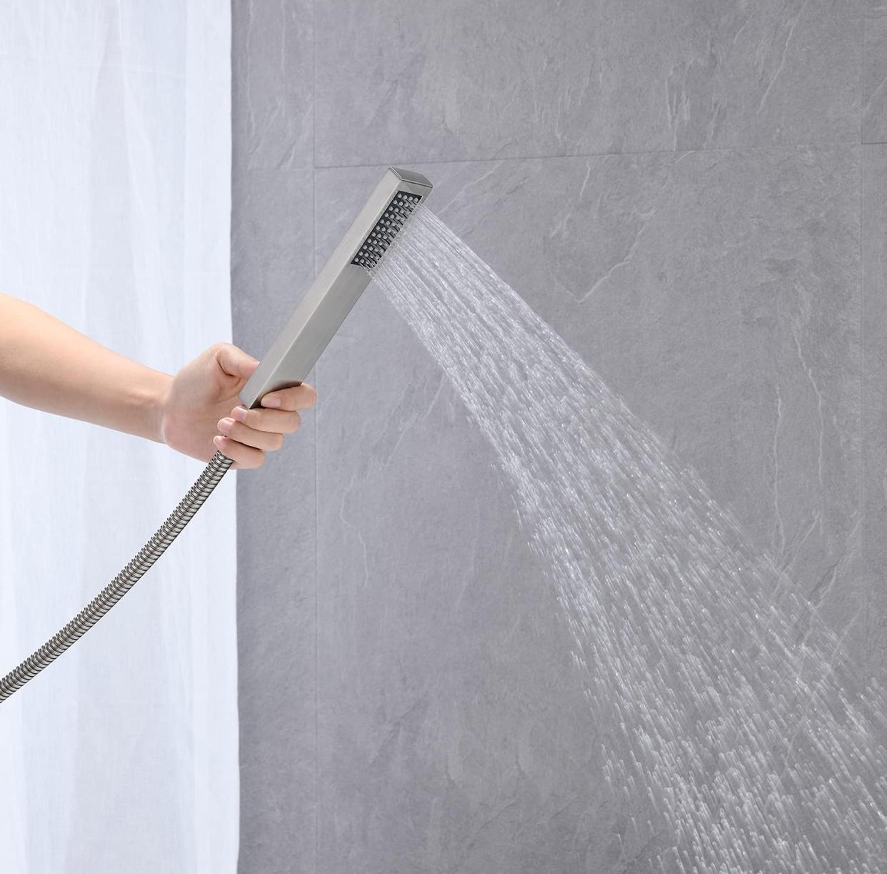 Waterfall Tub Filler Faucet Floor Mount Single Handle With Rough-In And Handheld Brushed Nickel Finish