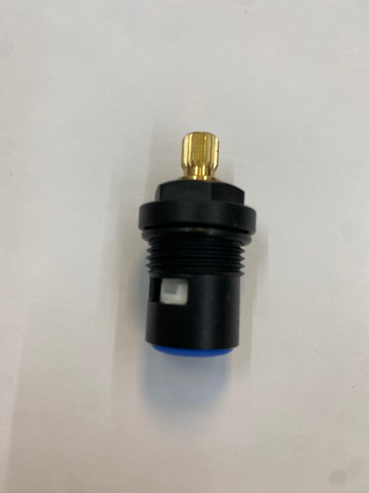 Black mechanical component with gold and blue accents on a white background