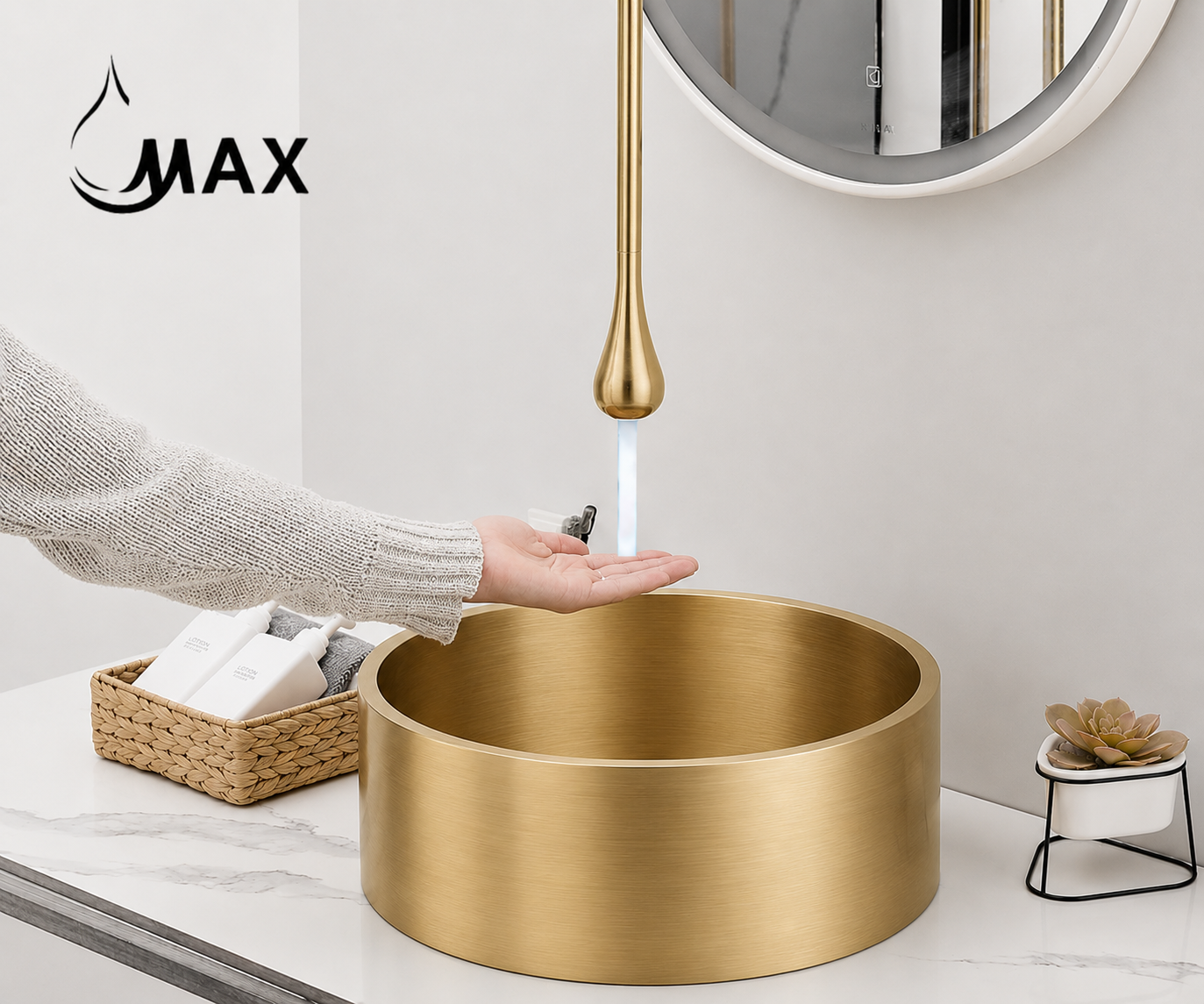 Gold sink with faucet in a bathroom setting, featuring the brand 'MAX'.