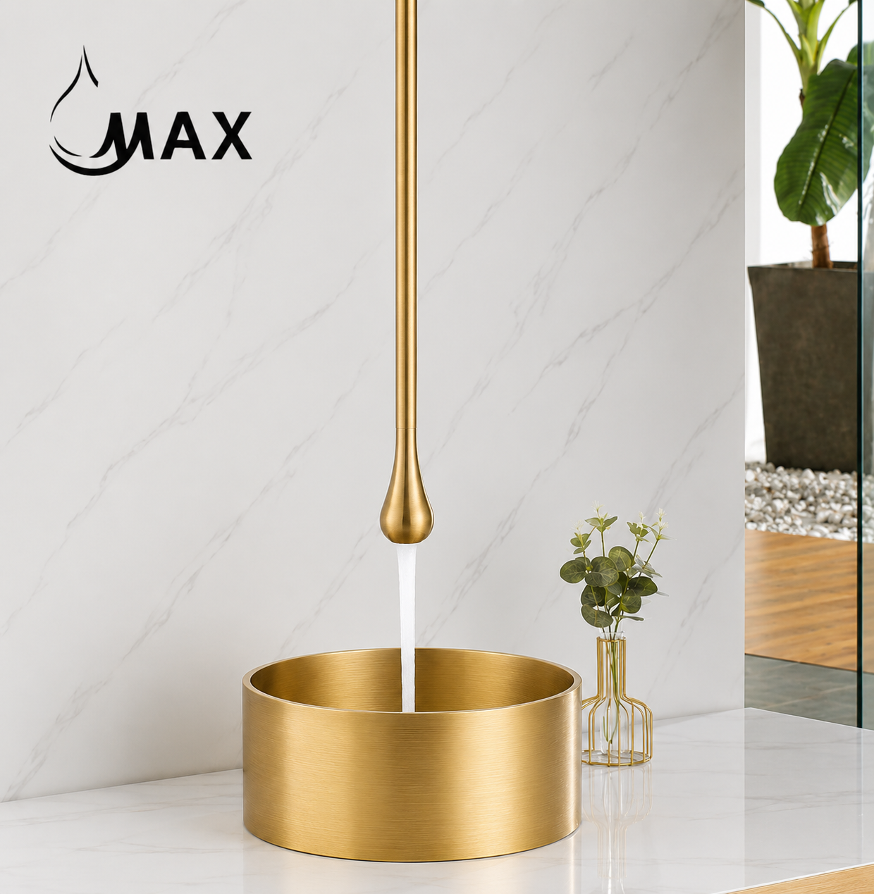 Gold faucet with water flowing into a sink, brand 'MAX' visible