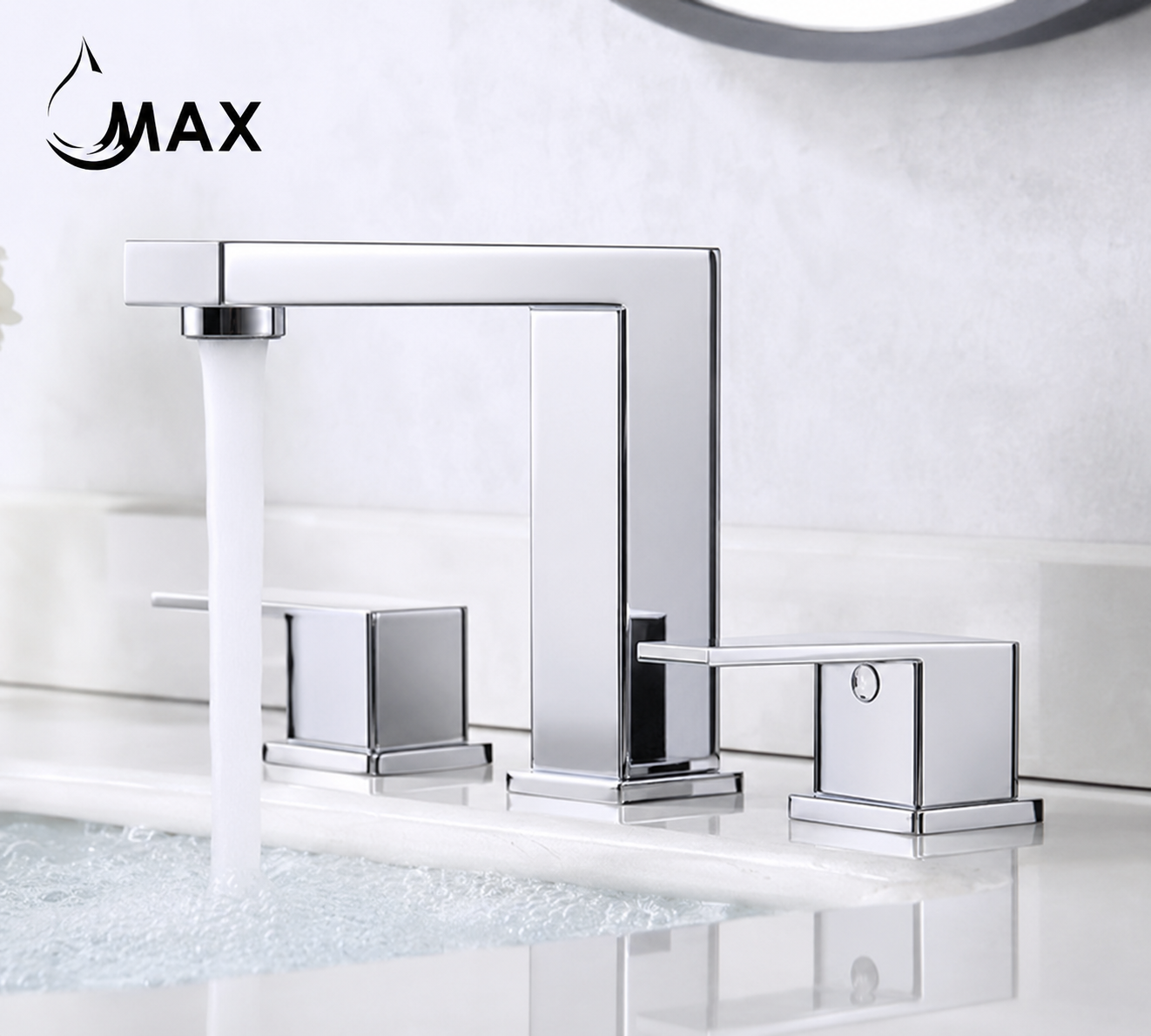 A modern chrome two-handle bathroom faucet with a tall rectangular spout and flowing water, shown installed on a white sink against a light tiled wall. The brand name MAX appears in the upper left.