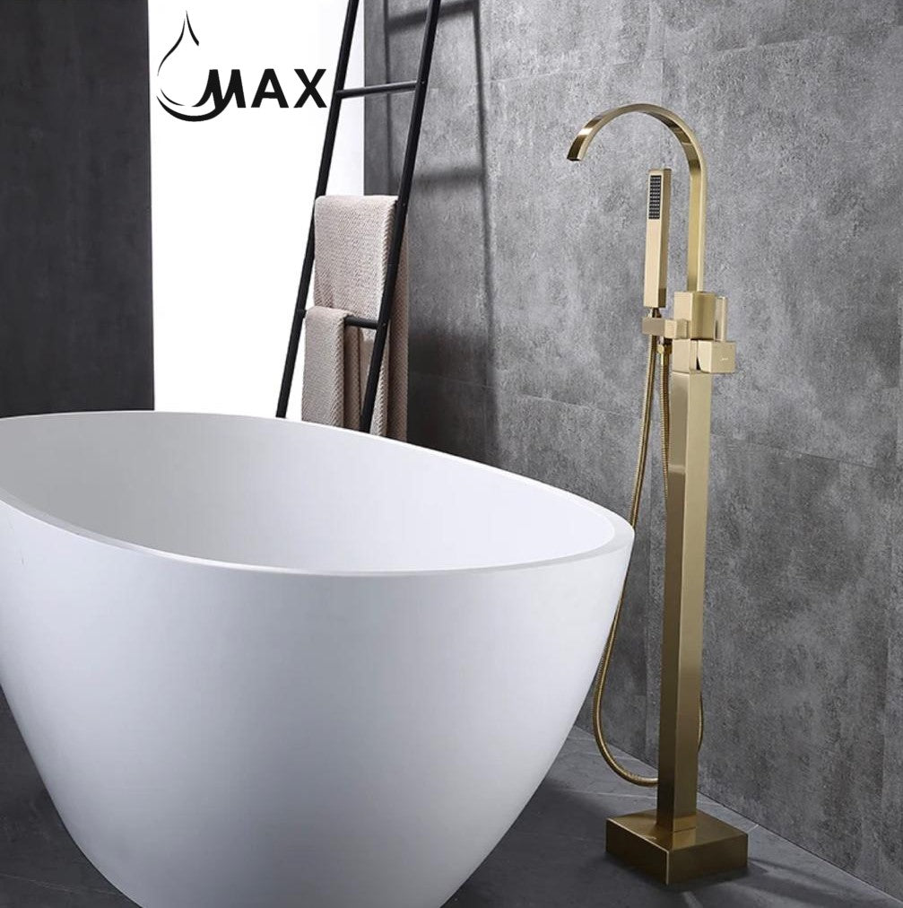 A freestanding bathtub filler faucet with a brushed gold finish, featuring a single handle and a 360-degree swivel spout, mounted on a white bathtub, with a handheld shower hose attached.