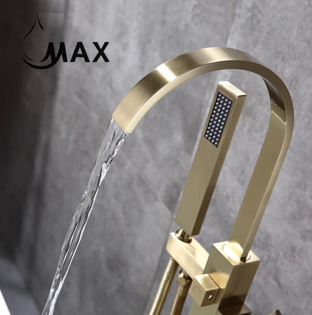 A freestanding bathtub filler faucet with a brushed gold finish, featuring a single handle and a 360-degree swivel spout, mounted on a white bathtub, with a handheld shower hose attached.