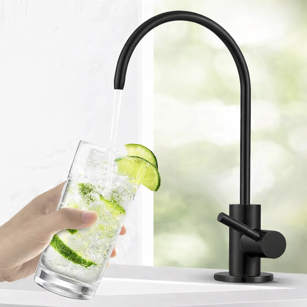 Matte white water filter faucet with minimalist design pouring filtered water into glass