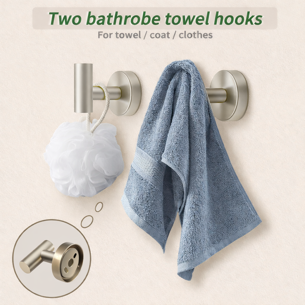Brushed nickel double robe hooks holding towel and bath sponge on bathroom wall