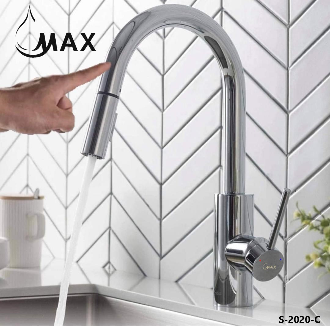 Polished chrome Smart Touch pull-out kitchen faucet installed above a stainless steel sink