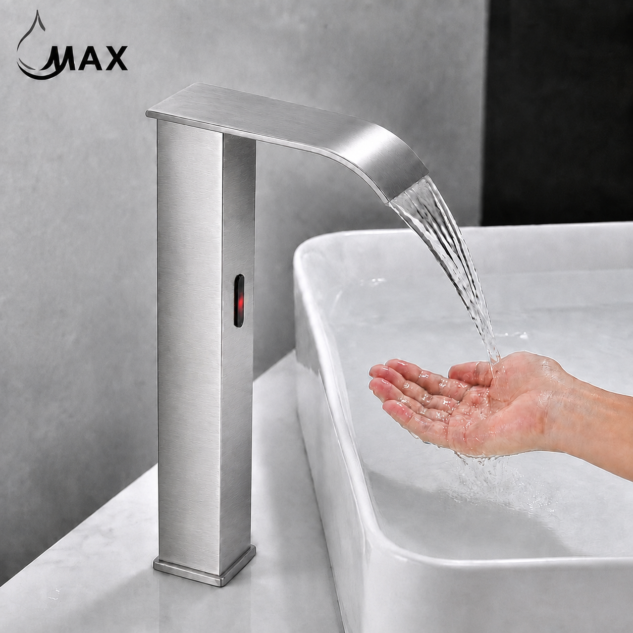 A modern brushed stainless steel waterfall bathroom faucet with a touch sensor, shown dispensing water into a white ceramic sink while a hand is held under the stream. The brand name 'MAX' is visible in the top left corner.