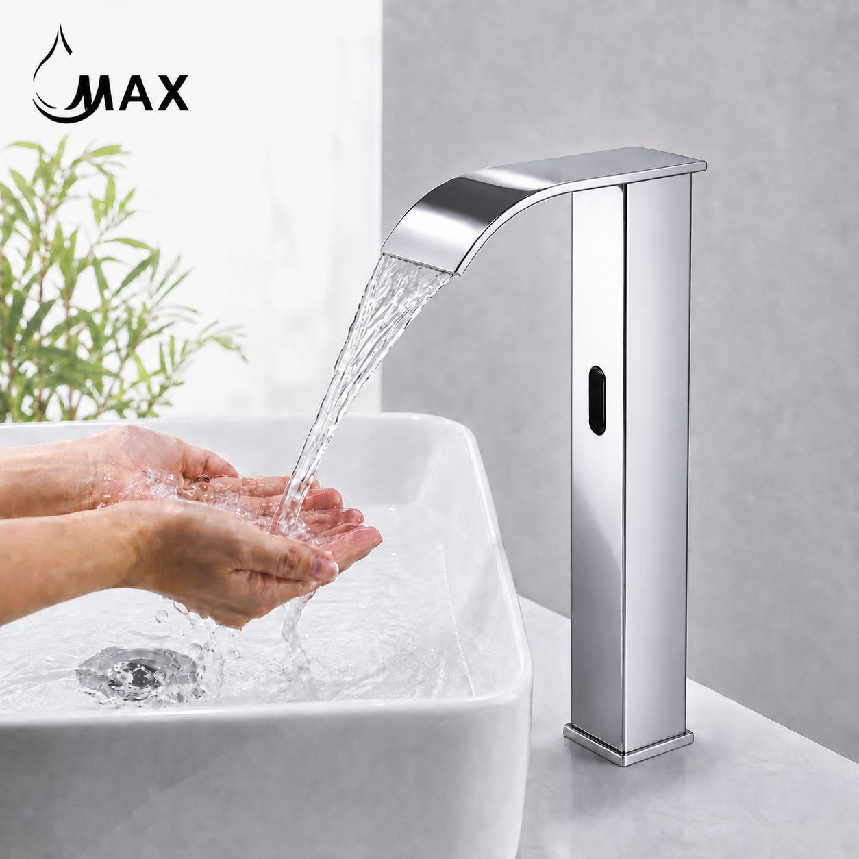 A modern chrome tall-spread basin faucet shown next to a white vessel sink against a light gray wall. The brand name 'MAX' is visible in the top left corner.