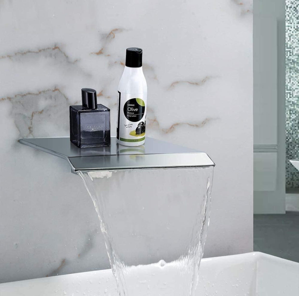 Chrome waterfall tub spout with integrated shelf design for bathroom accessories