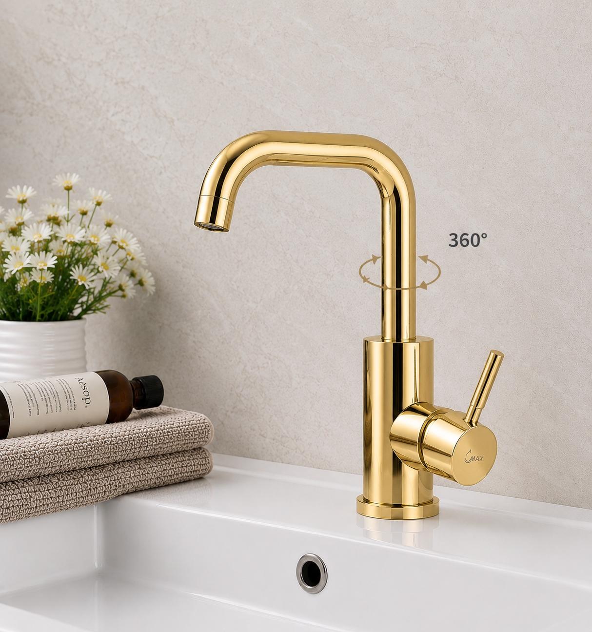 MAX Faucets shiny gold bathroom faucet delivering smooth water flow into a bathroom sink.