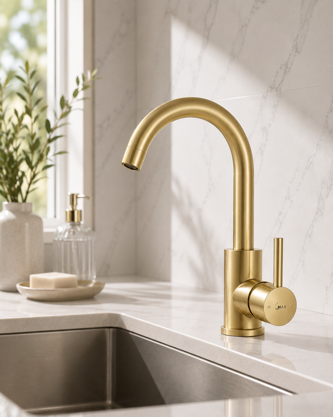 MAX Faucets brushed gold bathroom faucet with side handle and 360° swivel gooseneck spout installed on a modern bathroom vanity.