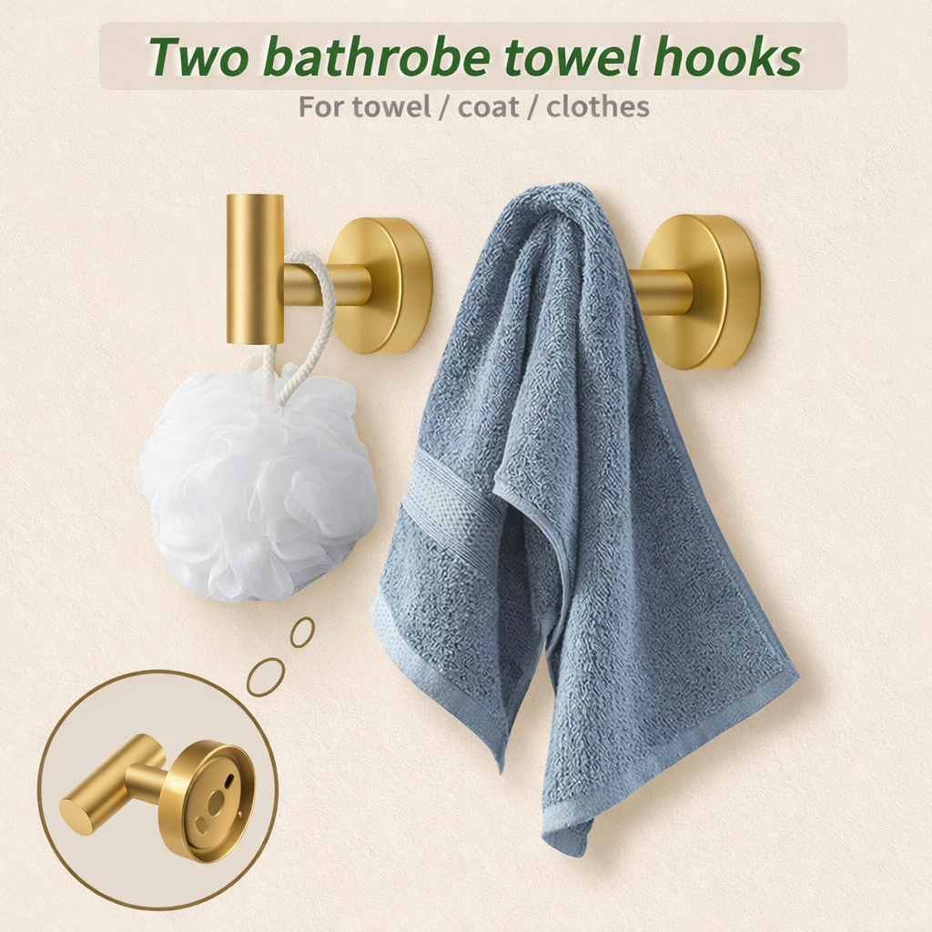 Brushed gold double robe hooks holding towel and bath sponge on bathroom wall