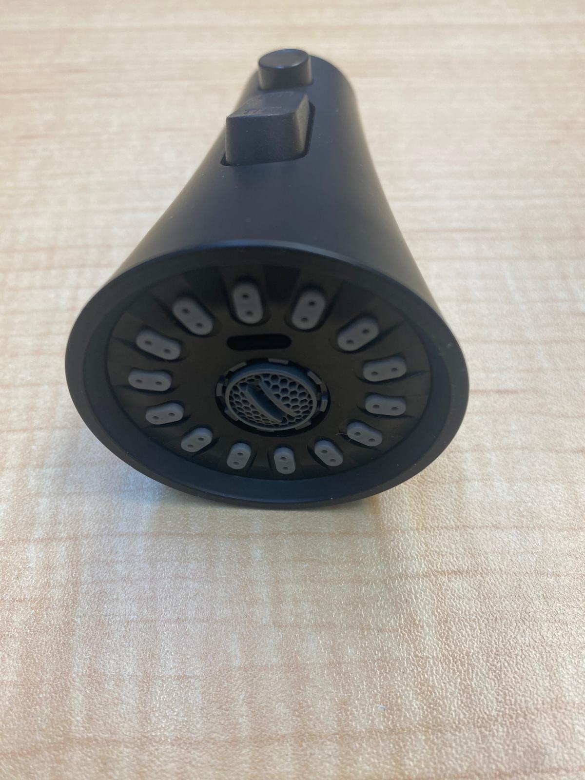 Close up detail of matte black finish on MAX Faucets kitchen faucet replacement head