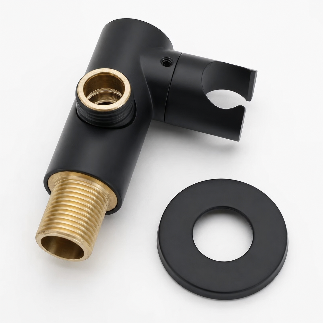Black and brass plumbing valve on a white background