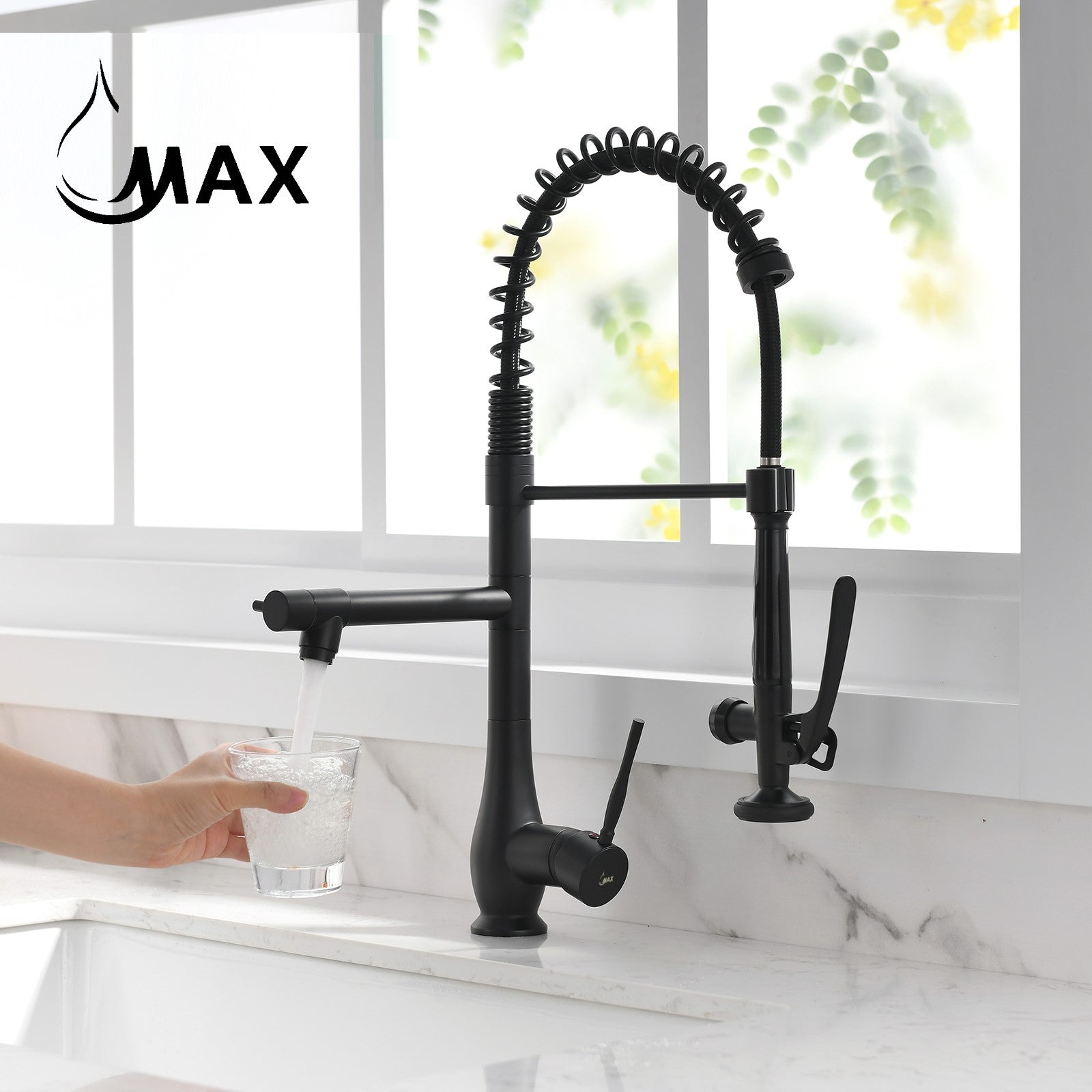 Matte black separate pot filler spout in stream mode filling a glass with water