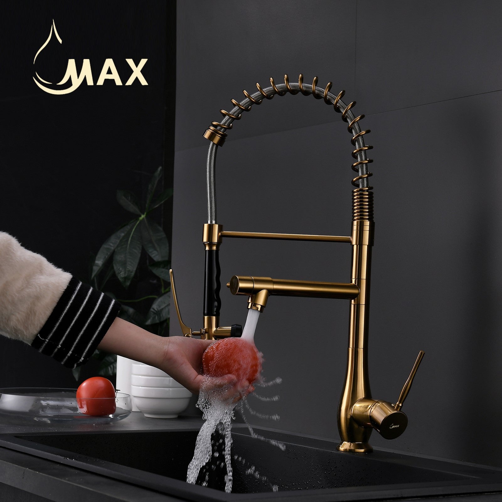 MAX Faucets Separate the pot filler spout in brushed gold stream mode, filling a glass with water