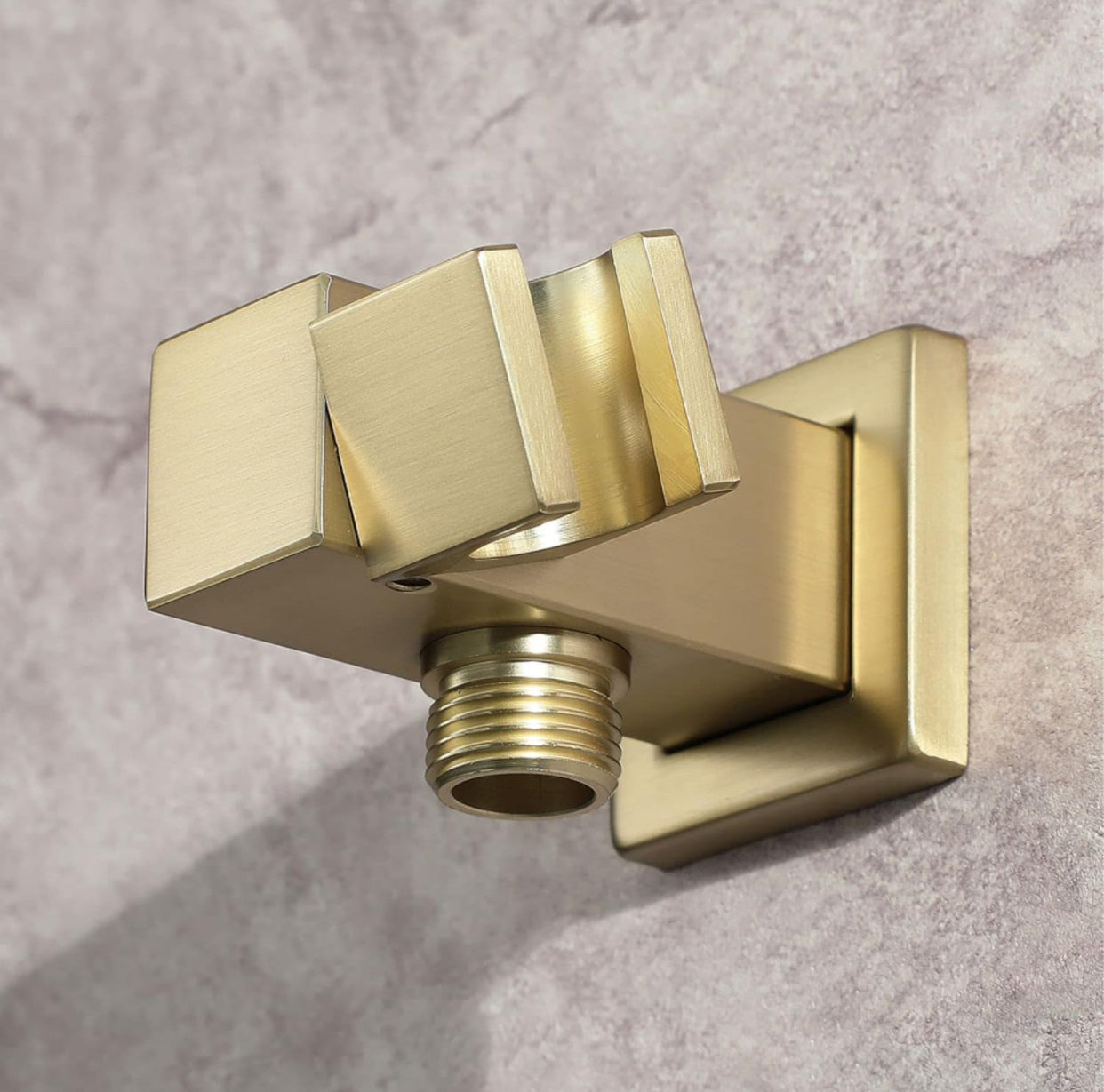 Close-up of brushed gold square shower outlet elbow holder detail