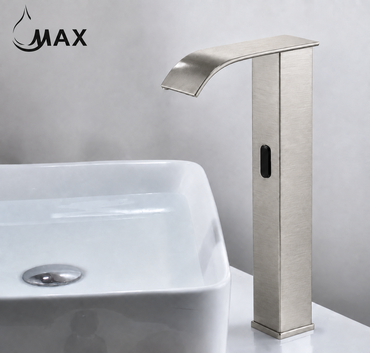 A brushed nickel single-handle bathroom faucet with a curved spout, shown installed next to a white ceramic vessel sink. The brand logo 'MAX' is visible in the top left corner.