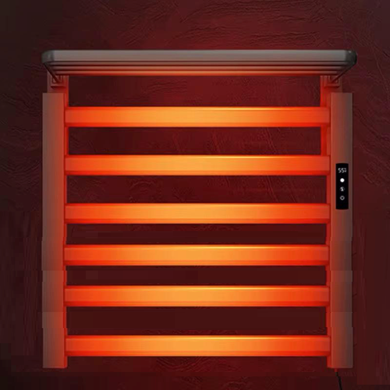 Wall-mounted brushed nickel electric towel warmer rack in bathroom