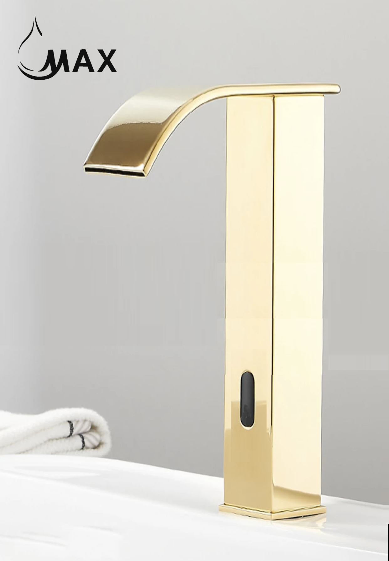 Gold faucet on a white surface with a gray background
