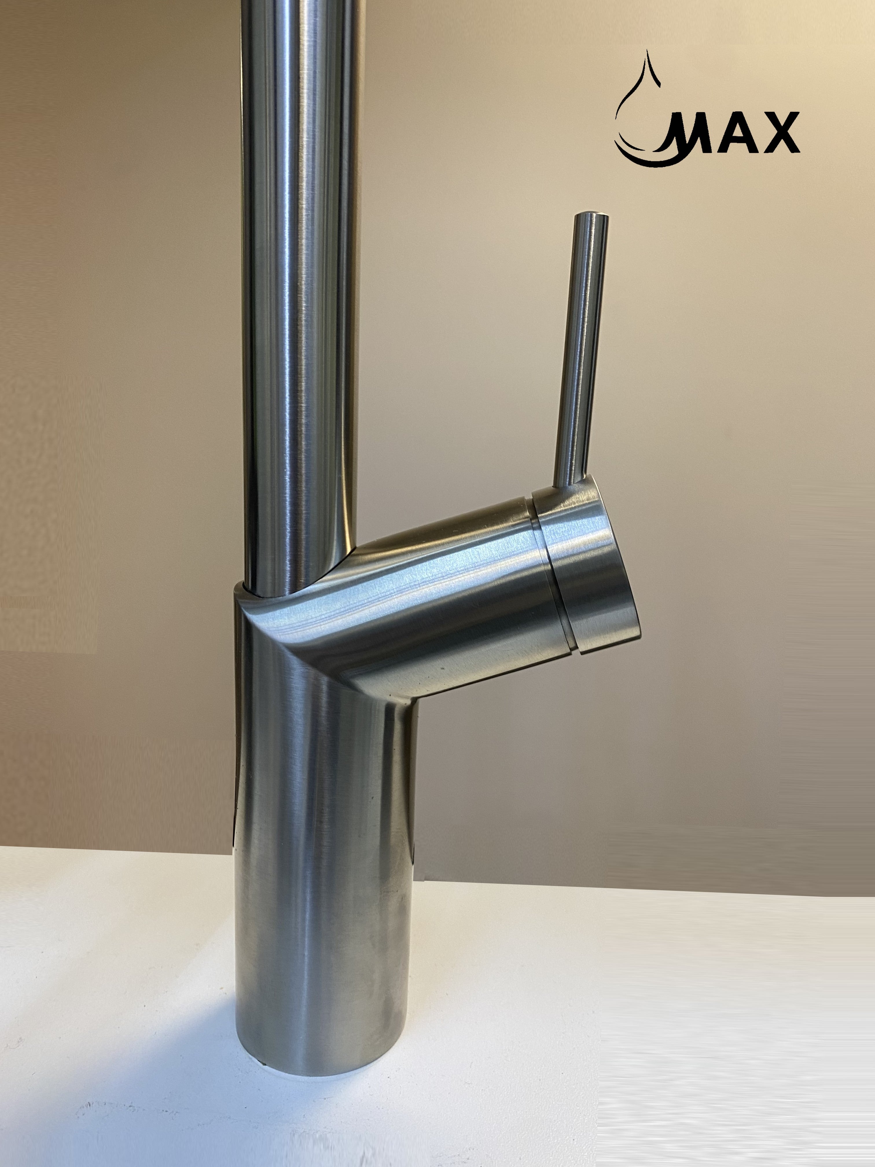 Brushed nickel pull-out kitchen faucet with modern high-arc design handel