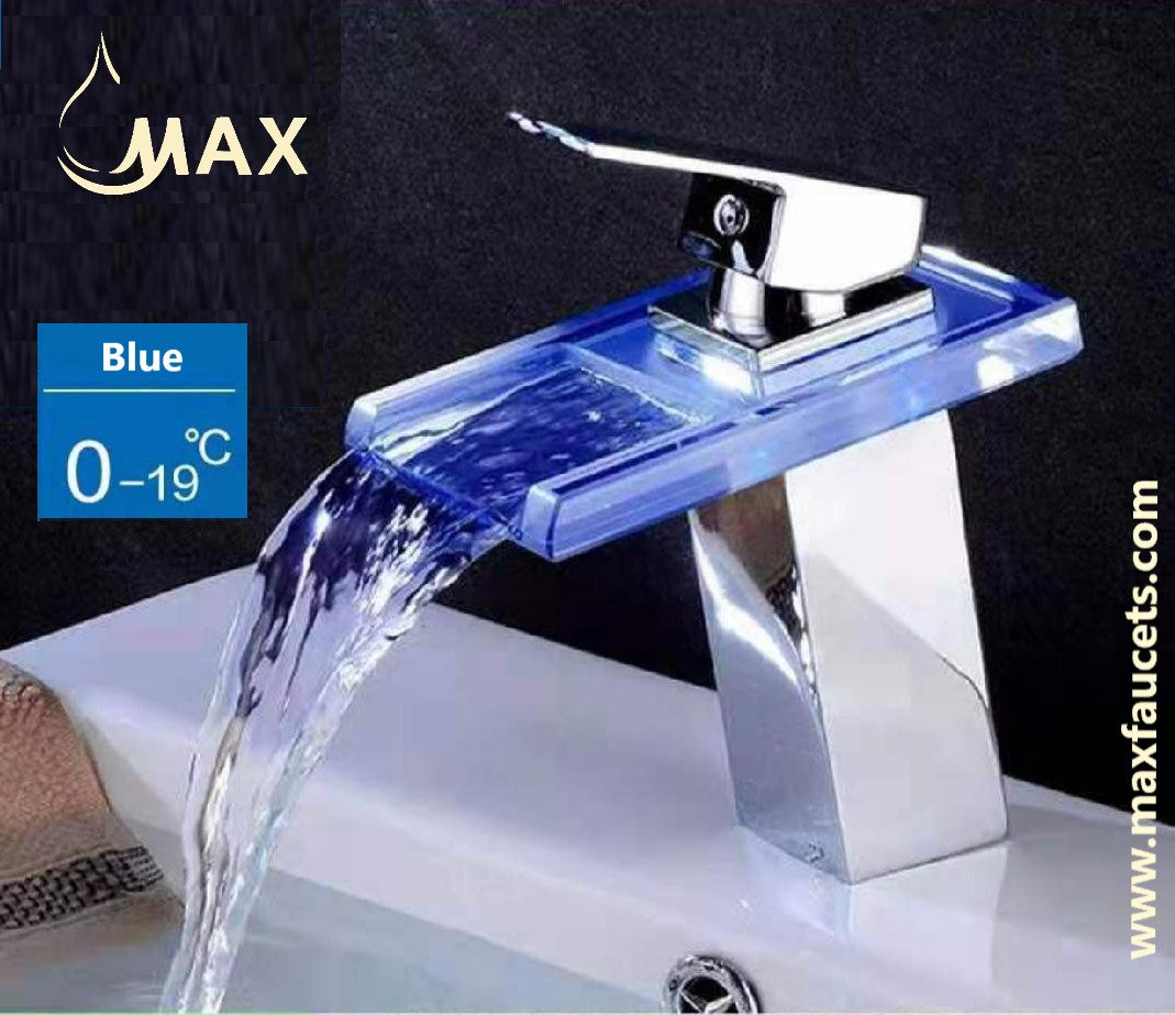 Chrome faucet with blue water flow on a black background, featuring the MAX brand.