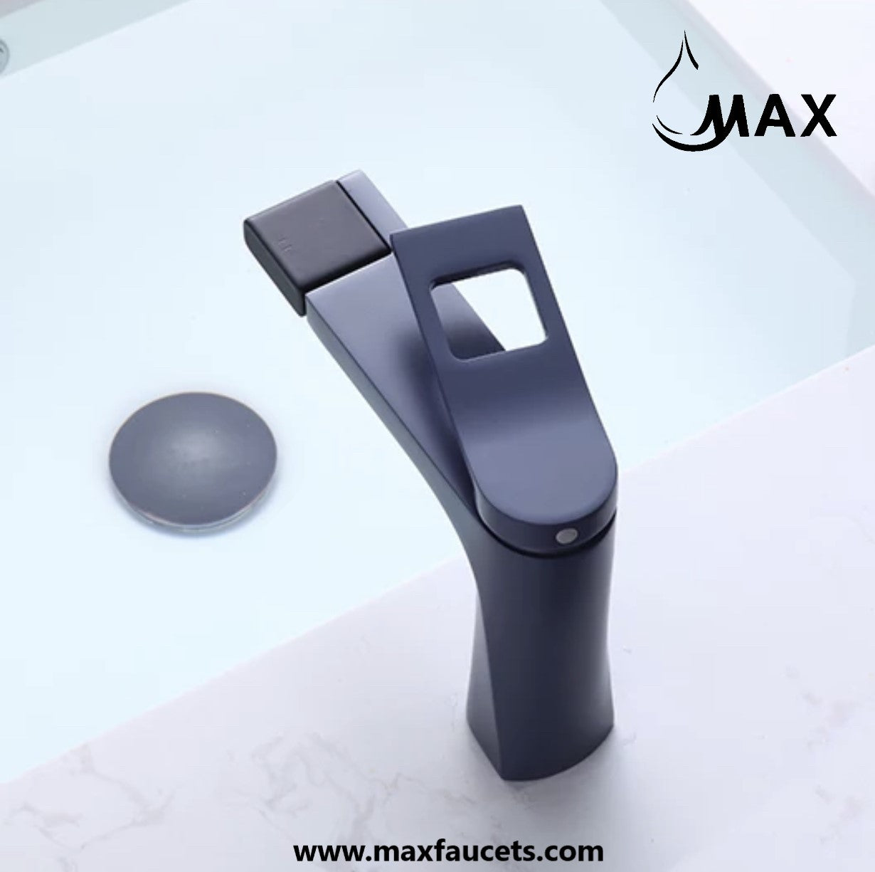 Black faucet on a marble countertop with 'MAX' branding.