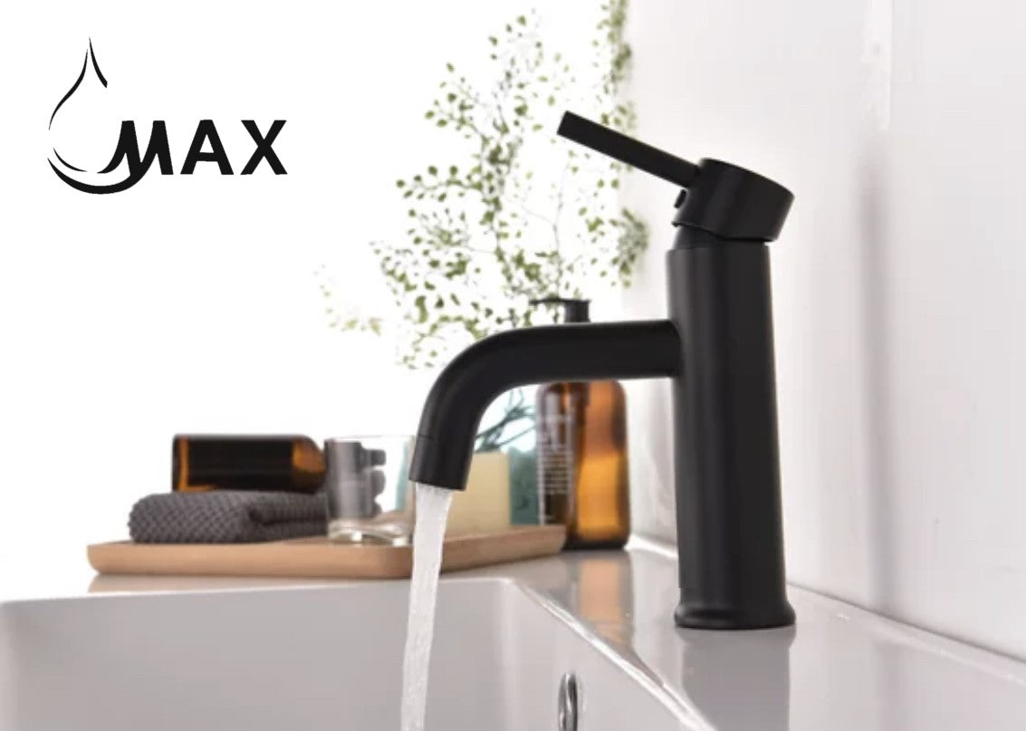 Black faucet with water flowing on a kitchen counter, featuring the MAX brand logo.