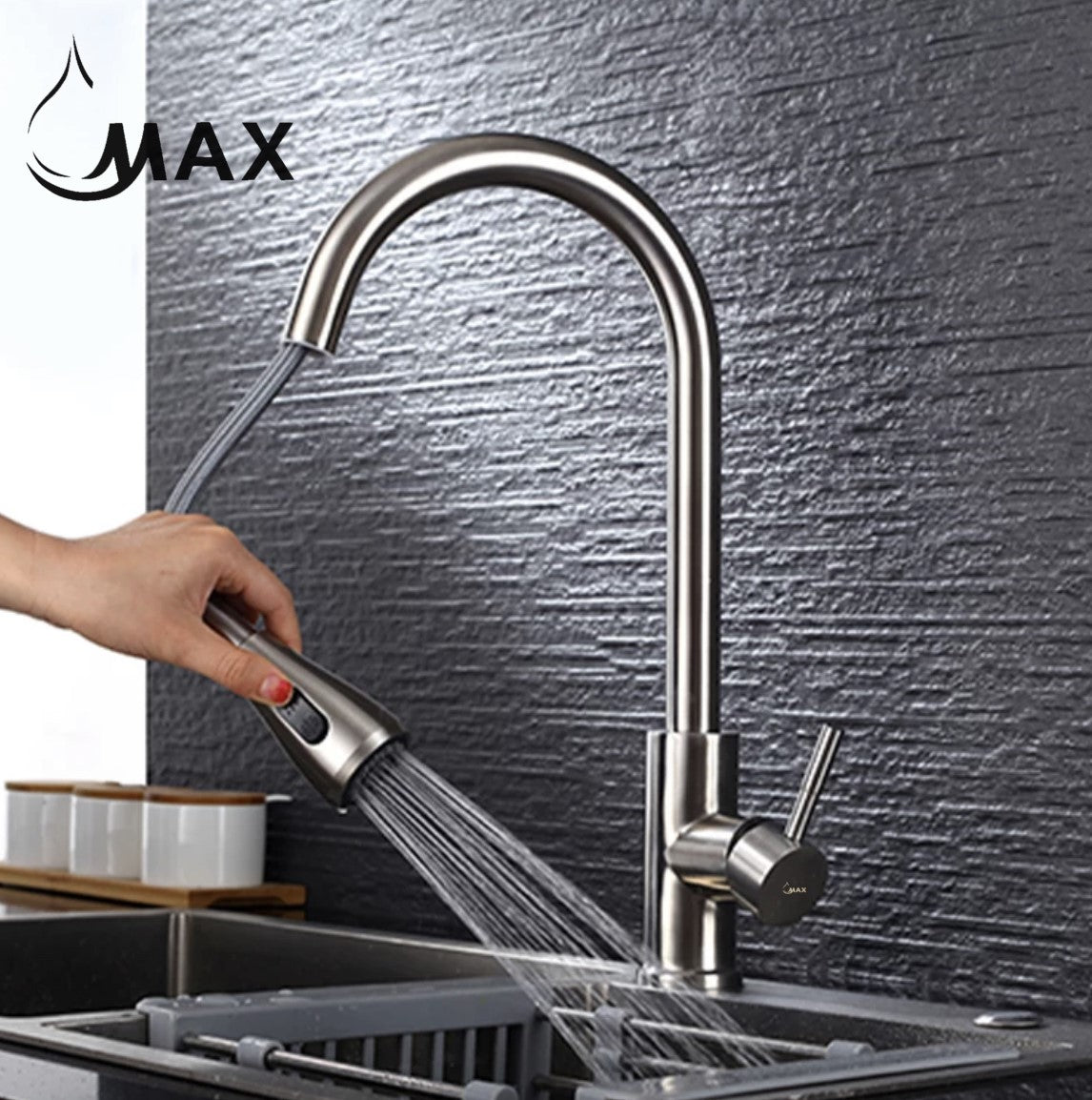 Close-up of pull-out faucet spray head and nozzle in brushed nickel finish